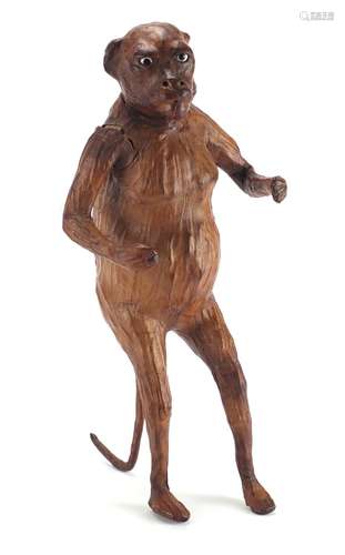 Victorian leather monkey with beaded glass eyes, 36cm high : For Further Condition Reports and