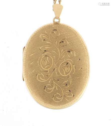 Large 9ct gold locket on a 9ct gold rope twist necklace, the locket 6.5cm in length, approximate