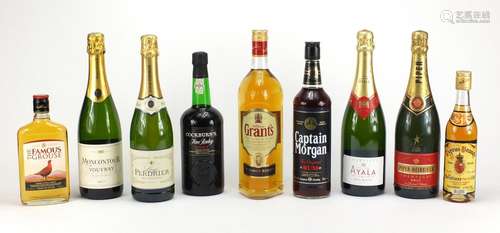 Nine bottles of alcohol including Grants, The Famous Grouse, Piper-Heidsieck champagne and Louis