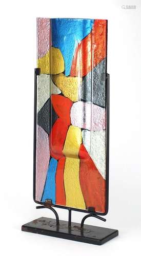 Modernist painted glass sculptural vase housed in a metal stand, overall 61cm high : For Further