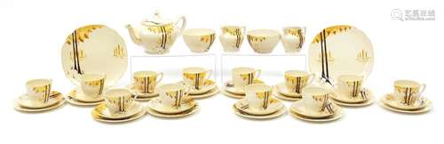 Art Deco teaware including teapot and trio's, each decorated with stylised trees : For Further