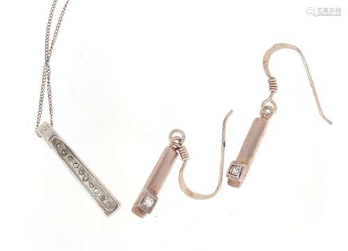 9ct white gold diamond pendant on a 9ct white gold necklace and a pair of similar silver earrings,