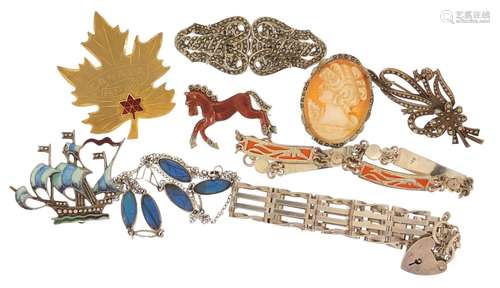 Silver and white metal jewellery including marcasite brooches, enamelled horse brooch, cameo