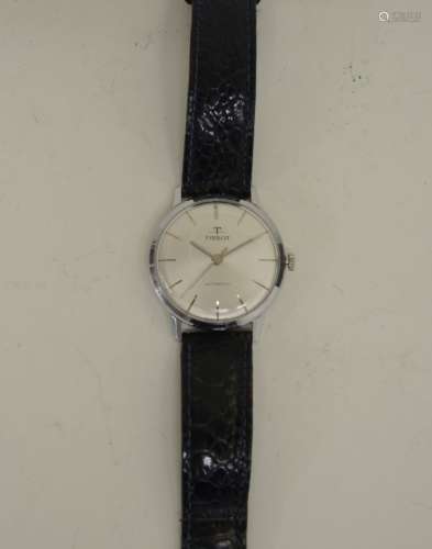 Tissot ArmbanduhrEdelstahlgehäuse, Ø 34 mm. Silbernes Zifferblatt mit Stabindizes, Leuchtzeiger,
