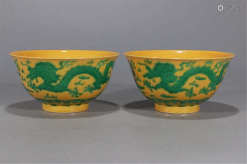 PAIR OF CHINESE PORCELAIN YELLOW GROUND GREEN DRAGON BOWLS