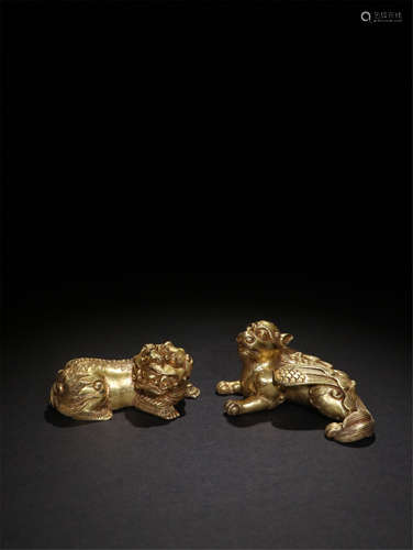 PAIR OF CHINESE GILT BRONZE COUCHING BEAST PAPER WEIGHT