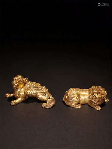 PAIR OF CHINESE GILT BRONZE BEAST PAPER WEIGHT