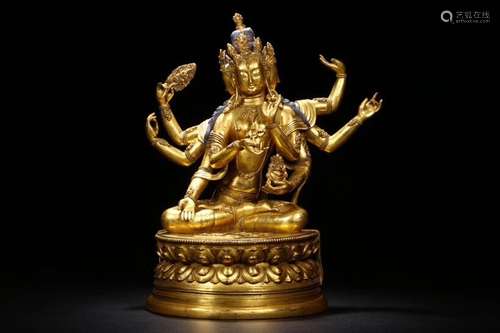 A GILT-BRONE FIGURE OF USHNISHAVJAYA