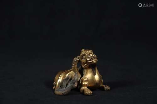 A GILT-BRONZE PAPER WEIGHT