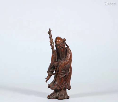 A HUANGYANG WOOD FIGURE OF LIFE GOD