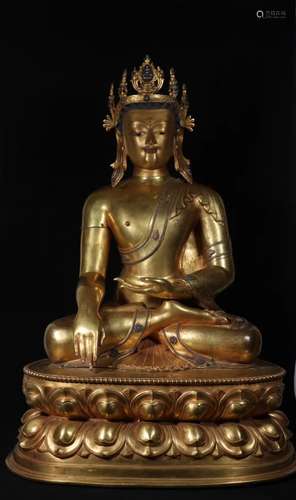 A GILT-BRONZE FIGURE OF AMITAYUS