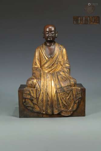 A GILT-BRONZE FIGURE OF BUDDHA