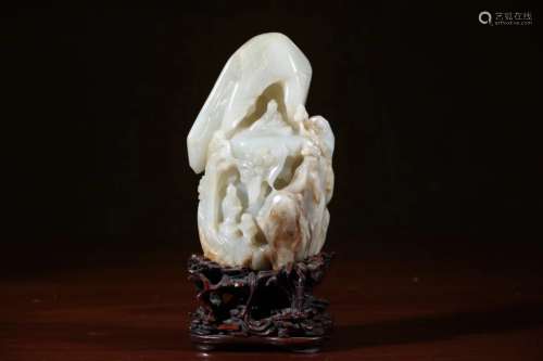 A HETIAN JADE CARVED ORNAMENT OF A MOUNTAIN