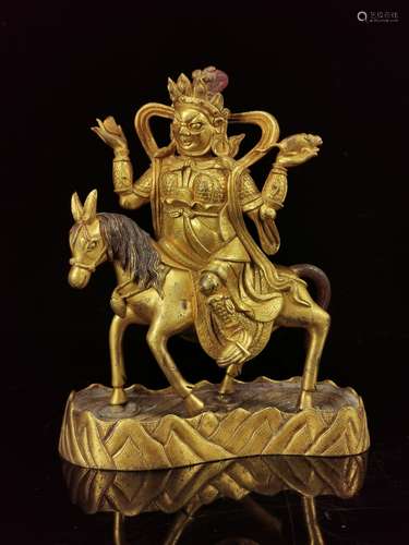 A GILT-BRONZE FIGURE OF SHANGPA KARPO, QING PERIOD