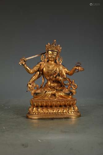 A GILT-BRONZE FIGURE OF SHADAKSHARI LOKESHVARA