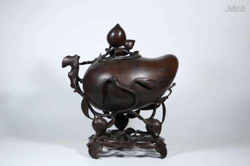 A BRONZE INCENSE BURNER IN 'PEACH' FORM