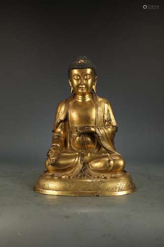 A GILT-BRONZE FIGURE OF AMITAYUS