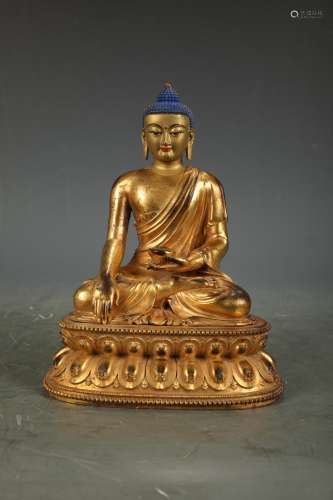 A GILT-BRONZE FIGURE OF AMITABHA