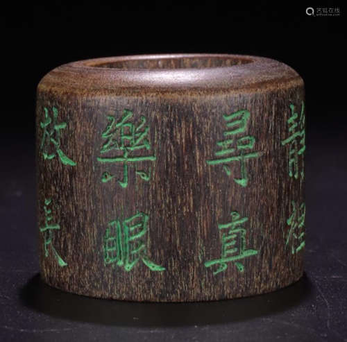 A CHENXIANG WOOD CARVED POETRY PATTERN RING