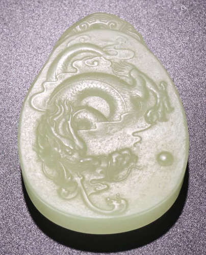 A HETIAN JADE CARVED DRAGON PATTERN PEDNDANT