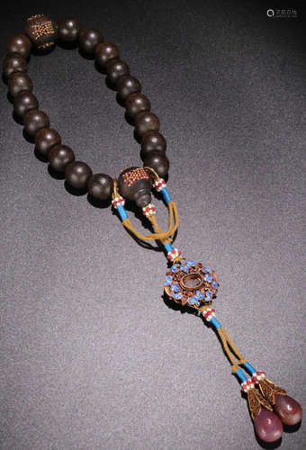 A CHENXIANG WOOD BEADS STRING BRACELET