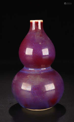 A PURPLE GLAZE GOURD VASE