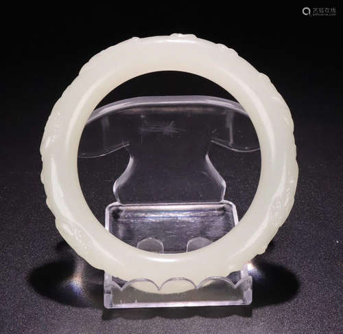 A HETIAN JADE CARVED BANGLE