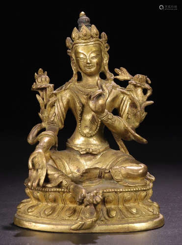 A TIBETAN GILT BRONZE BUDDHA