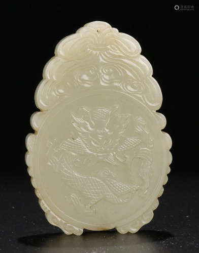 A HETIAN JADE CARVED DRAGON PATTERN PEDNDANT