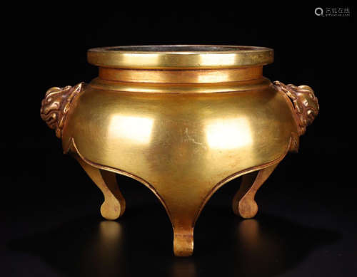 A GILT BRONZE CASTED DOUBLE EAR TRIPOD CENSER