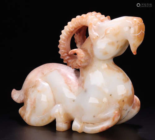 A HETIAN JADE CARVED SHEEP SHAPED PENDANT