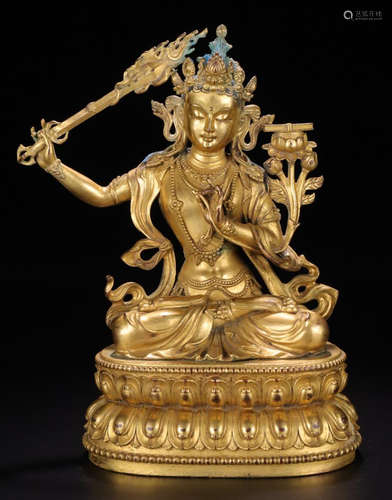 A GILT BRONZE CASTED MANJUSHRI BUDDHA