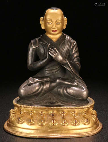 A GILT BRONZE CASTED GURU BUDDHA