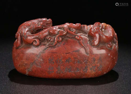 A SOAPSTONE CARVED TIGER SHAPED PEN WASHER