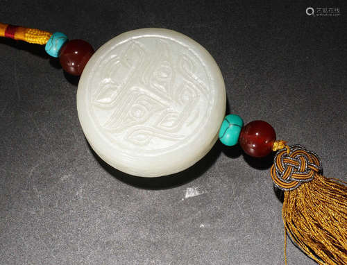 A HETIAN JADE CARVED AUSPICIOUS PATTERN PENDANT