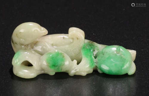 A JADEITE CARVED MAGPIE SHAPED PEN SHELF