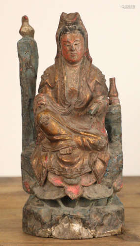 A LACQUER WOOD CARVED GUANYIN BUDDHA