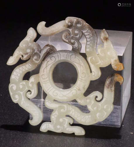 A HETIAN JADE CARVED BEAST PATTERN PENDANT