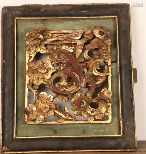 A WOOD CARVED DRAGON PATTERN BOARD
