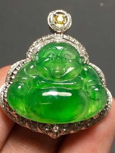 A GREEN JADEITE CARVED BUDDHA PENDANT, TYPE A