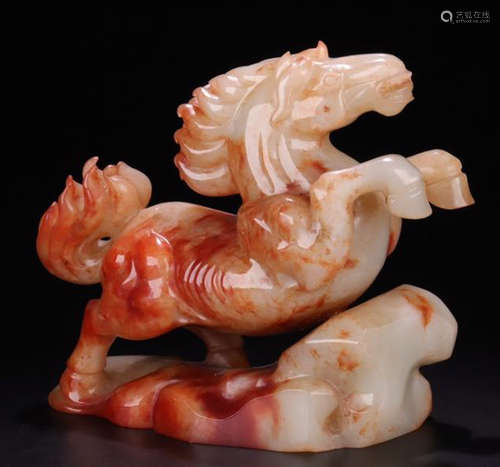 A HETIAN JADE CARVED HORSE SHAPED PENDANT