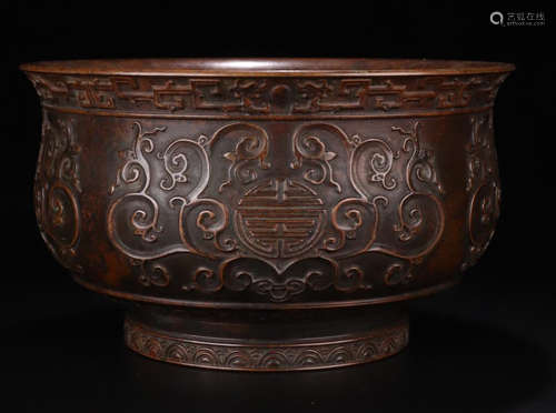 A BRONZE CASTED WRAPPED FLOWER PATTERN BOWL