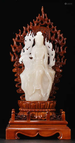 A HETIAN JADE CARVED GUANYIN BUDDHA WITH BASE