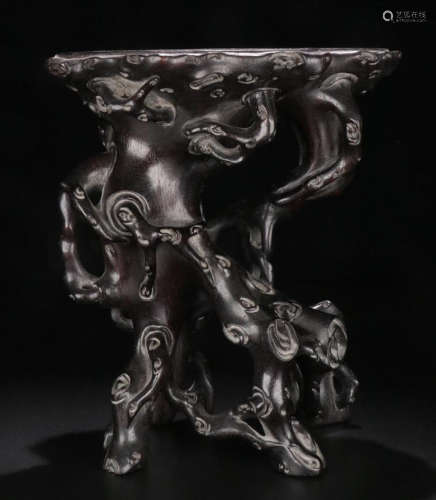 A XIAOYE ZITAN WOOD CARVED NATURE SHAPED BASE