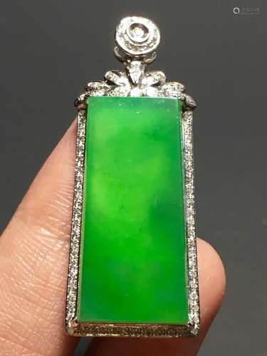 A GREEN JADEITE CARVED PINGAN PENDANT, TYPE A