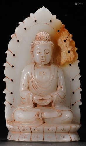 A HETIAN JADE CARVED SAKYAMUNI BUDDHA