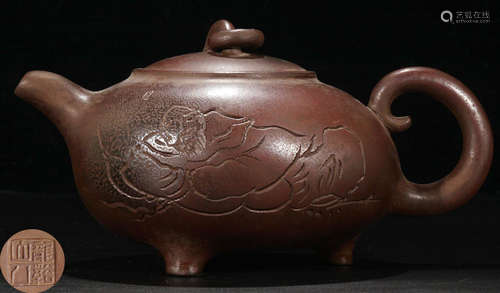 A ZISHA CARVED TRIPOD TEA POT