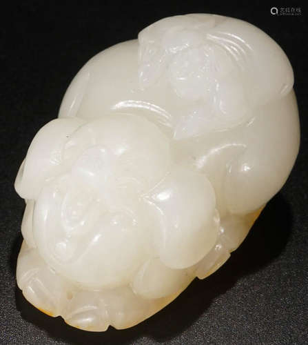 A HETIAN JADE CARVED PIG SHAPED PENDANT