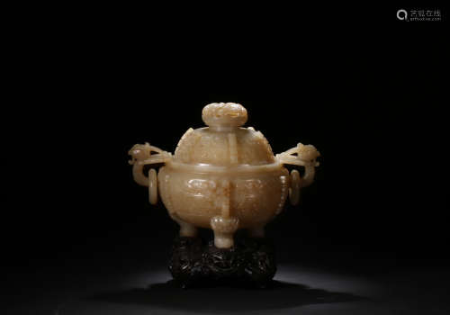 A HETIAN JADE TAOTIE SHAPED EAR THREE-LEGGED CENSER