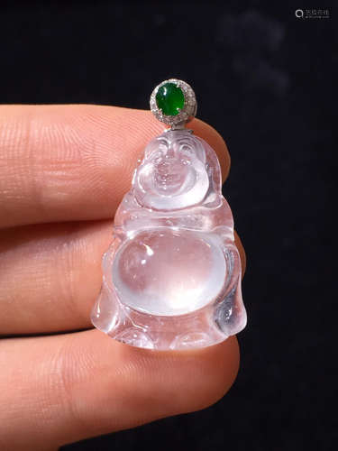 AN ICY JADEITE PENDANT CARVED IN BUDDHA